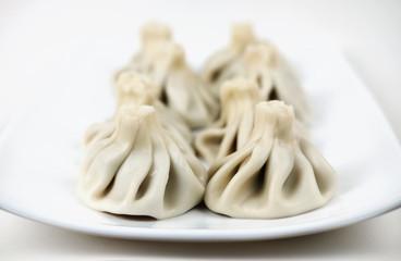 Khinkali on a white plate