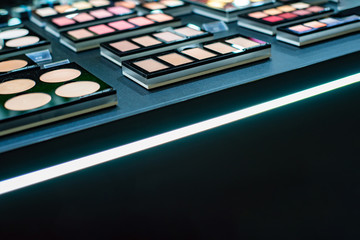 Set of makeup artist, eye shadow and powder for cosmetics and makeup for a beauty salon.