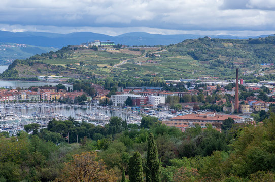 Aerial view over the sea beautiful Izola town, with old town and harbor