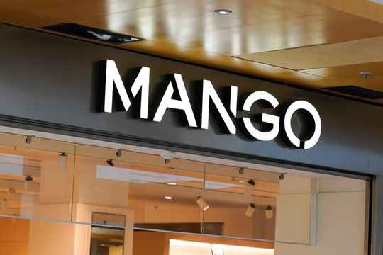 Mango logo shop sign store spain clothing manufacturing brand company