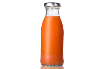 Glass bottle of carrot juice. Vegetable and fruit juice Isolated on a white background.