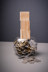 Jar filled with coins