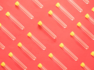 Analysis tube on red background pattern
