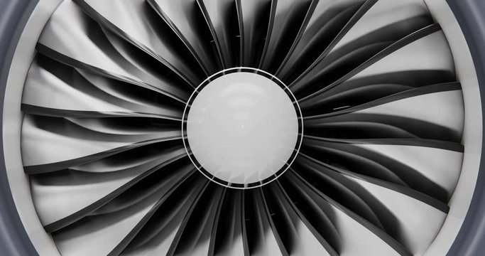 The turbine of a passenger liner slowly rotates in a looped animation. Close-up.
