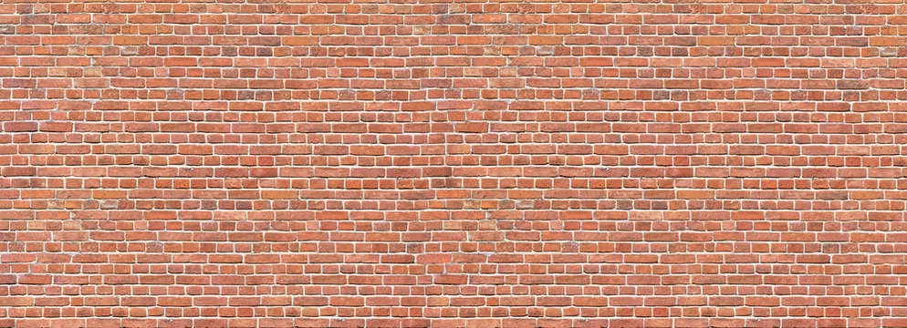 Brick wall. Old vintage brick wall pattern. Red brick wall panoramic background.