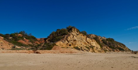 Beautiful beach Praia da Oura in Albufeira at the blue Atlantic ocean