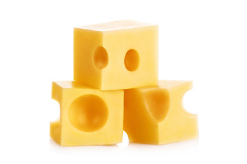 Close-up of cheese cubes, isolated on white