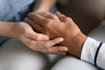 Two generations female family having trustful conversation.