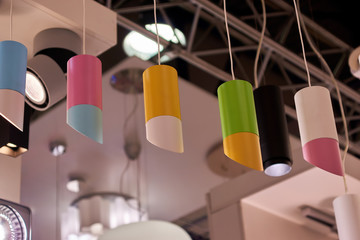 Fototapeta na wymiar Stylish colored lighting lamps. Design solution