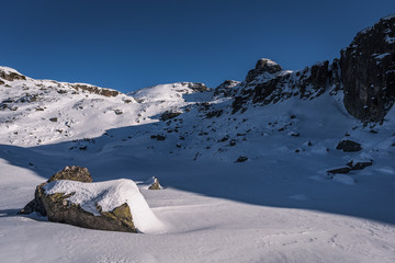 Beautiful winter landscape with snow covered mountain peaks