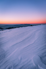 Winter sunrise from Rila mountain national park, Scary lake region, Bulgaria