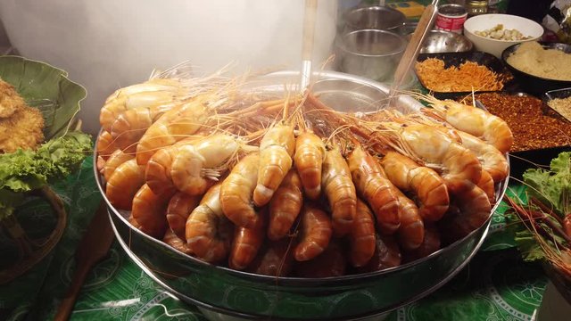 Thai street food: Hot prawn on night market.