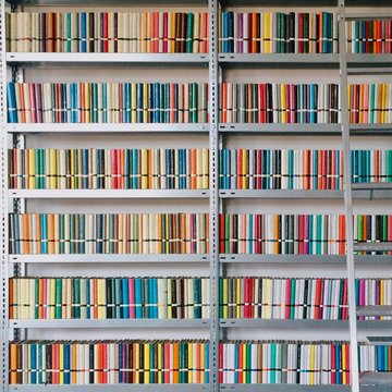 Full Frame Image Of Books Arranged On Shelves