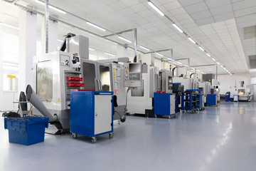 an interior shot of producing line of metal parts in modern plant