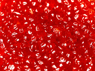 Texture of fresh red salmon caviar. Close-up, Flat lay. Can be used as a background