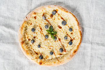 sweet pizza with fresh blueberries