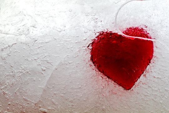 Abstract frozen heart in ice macro heartbreak Valentine cold heart no love