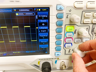 A Technician using electronic laboratory instrument