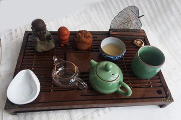 Tea ceremony with a teapot. Candid.