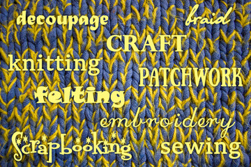 Blue and yellow knitted (knitting) woolen fabric texture with craft words on it