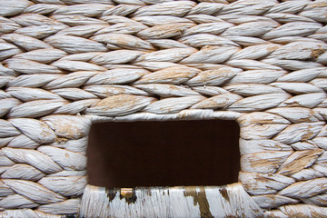 White wicker basket  texture (background) with a window for label