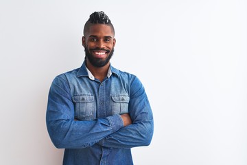 African american man with braids wearing denim shirt over isolated white background happy face smiling with crossed arms looking at the camera. Positive person.