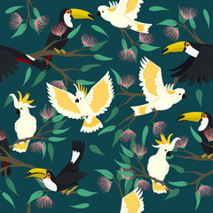 Seamless pattern with toucans and cockatoo. Vector graphics.