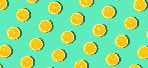 Summer and vitamins background. Lemon on a blue background, minimal food concept