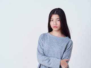 Obraz premium Smiling young woman over white background