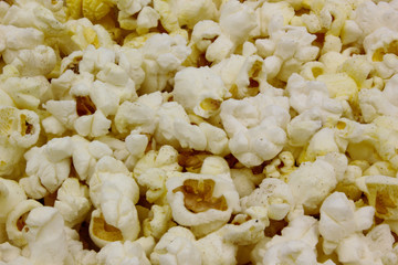 popcorn in bowl isolated on white