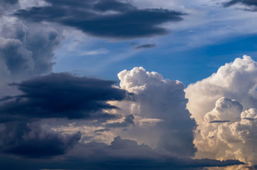 Beautiful stormy cumulus clouds in the sky, background.