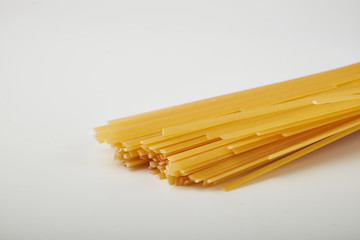 Spaghetti and basil isolated on white background. With clipping path.