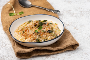 fired rice with vegetable on white backdrop