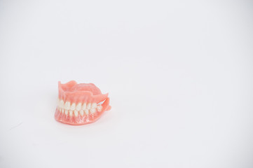 Dentures. Full removable denture. Isolate on white background