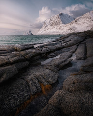 Famous haukland beach in lofoten islands north of norway. panorama picture of coast and rock formation, Vegen peak is popular hike trail. touristic favorite spot in lofoten