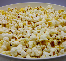 popcorn in a bowl isolated on white