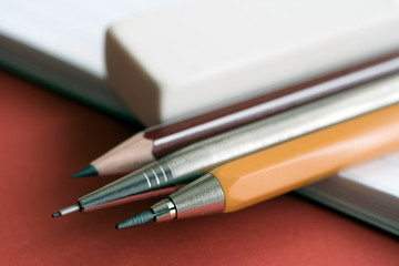 Close up shot of pencils on a red background