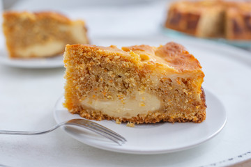 home made carrot cake cheesecake on a table