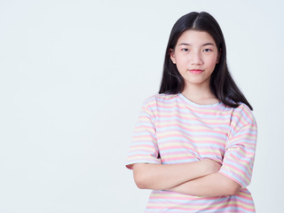 Obraz premium Smiling young woman over white background