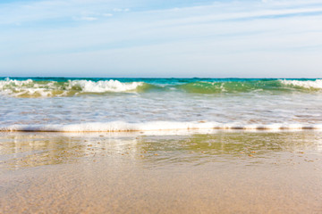 Bursts of sea waves on a tropical sea beach,