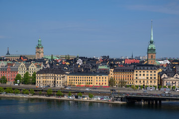 Fototapeta na wymiar Embankment of the old city on a sunny day. Stockholm, Sweden.