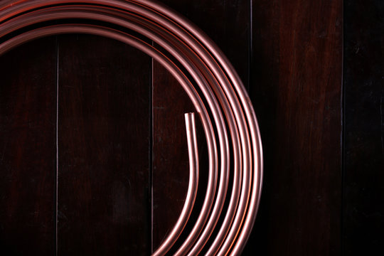 Directly Above Shot Of Coiled Copper On Table