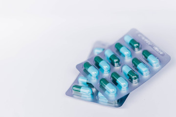 Top view of Antibiotics (Amoxicillin) capsules in blister pack isolated on white background.