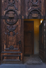 Fototapeta na wymiar An ancient door to St. Catherine's Basilica. St. Petersburg, Russia. December 28, 2019.