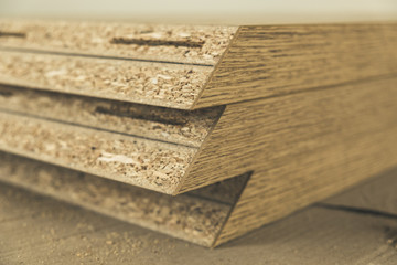Wooden texture chipboard boards cut and prepared for installation