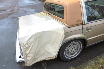 Old, broken Mercedes. Broken headlight
