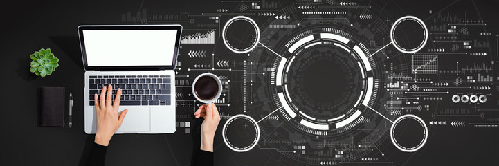 Tech circle with person using a laptop computer