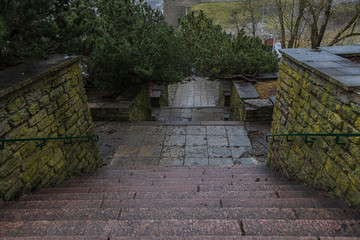 Old staircase on a rainy day. grain effect applied.