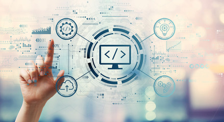Web development concept with hand pressing a button on a technology screen