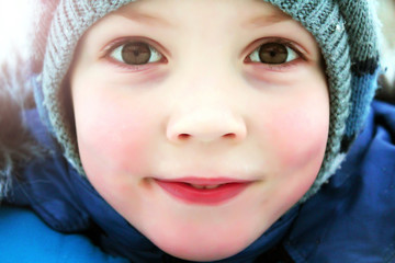 Portrait of a boy so close in winter
